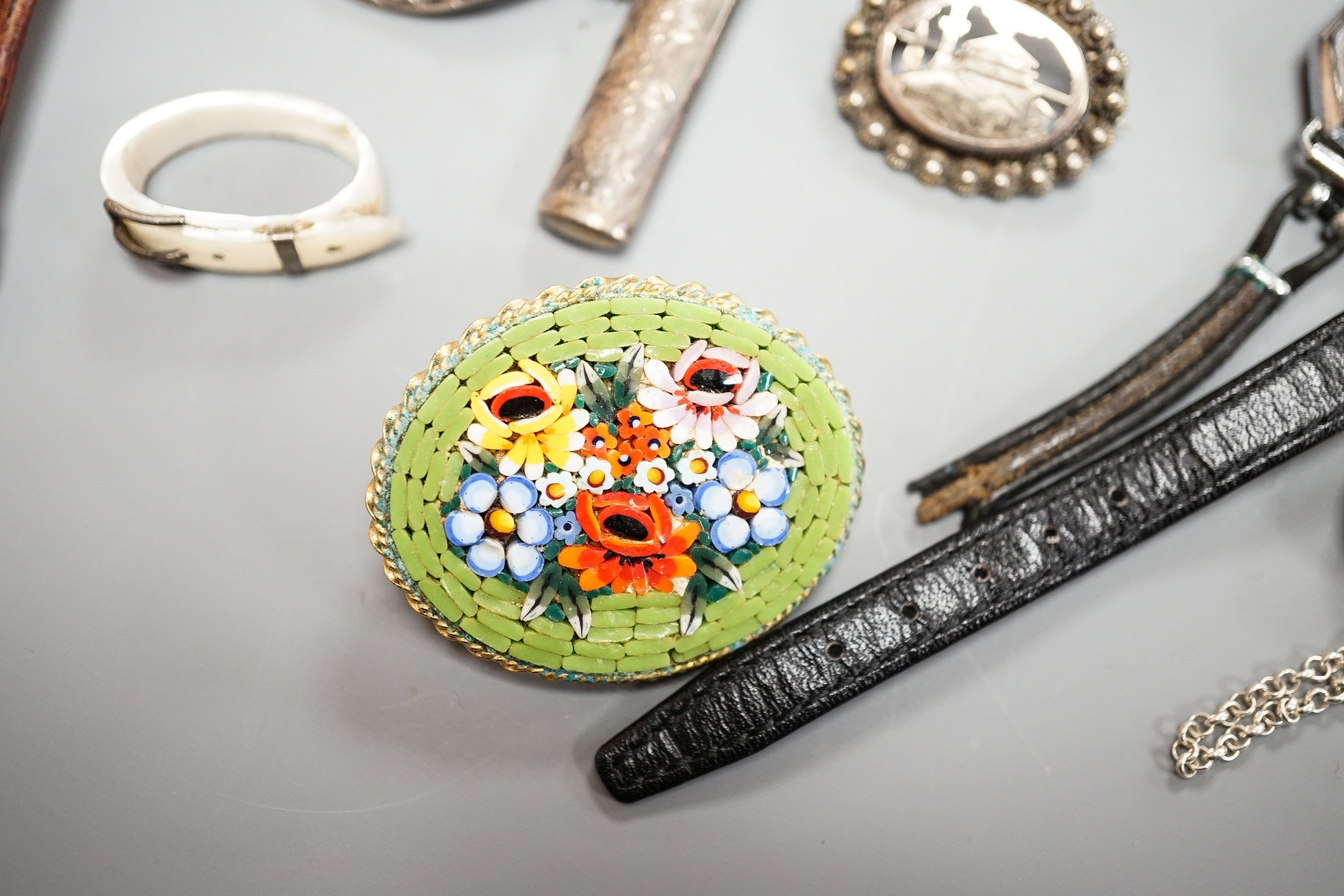 An engraved silver bangle, two silver brooches, including Scottish, two lady's wrist watches and a small group of minor jewellery, etc.